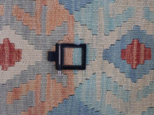 Corner detail of New Modern Design rug showing border pattern and Wool pile