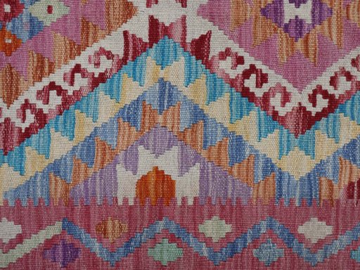 Backside of handmade New Modern Design rug showing knot structure and weave density