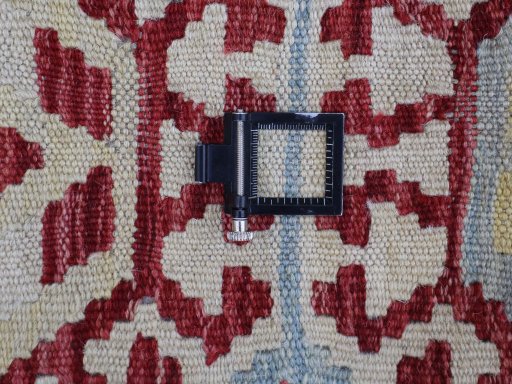 Corner detail of New Modern Design rug showing border pattern and Wool pile