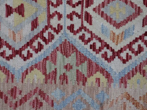 Backside of handmade New Modern Design rug showing knot structure and weave density