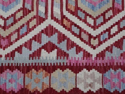 Backside of handmade New Modern Design rug showing knot structure and weave density
