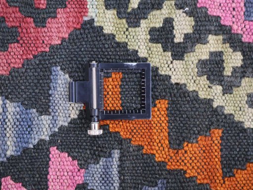 Corner detail of New Modern Design rug showing border pattern and Wool pile
