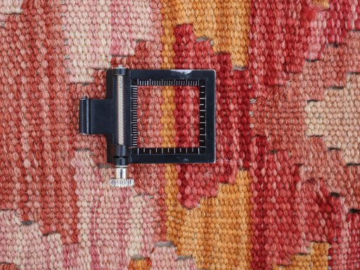 Corner detail of New Modern Design rug showing border pattern and Wool pile