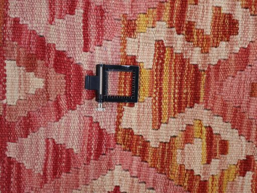 Corner detail of New Modern Design rug showing border pattern and Wool pile