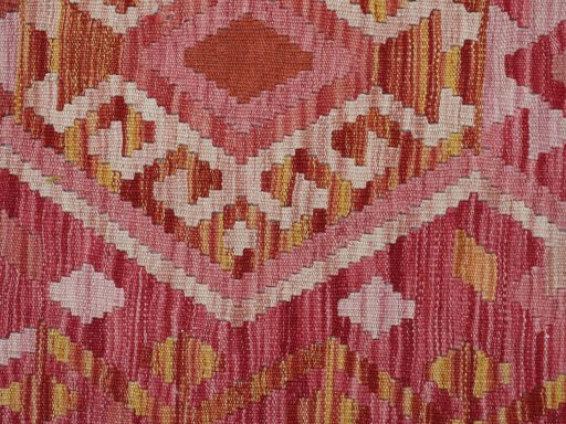 Backside of handmade New Modern Design rug showing knot structure and weave density