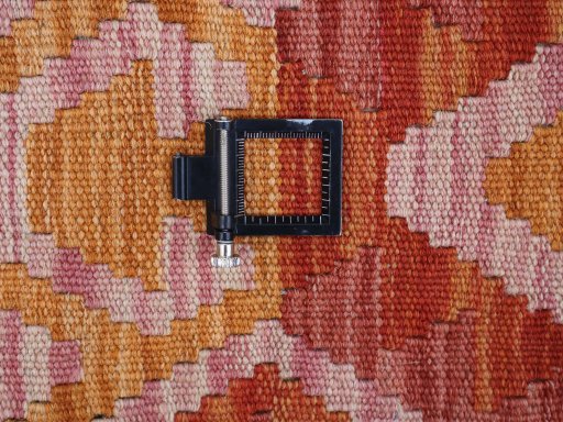 Corner detail of New Modern Design rug showing border pattern and Wool pile