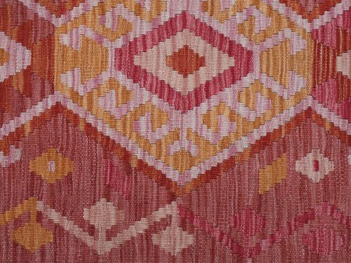 Backside of handmade New Modern Design rug showing knot structure and weave density