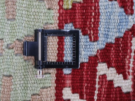 Corner detail of New Modern Design rug showing border pattern and Wool pile