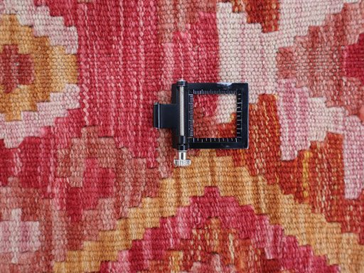 Corner detail of New Modern Design rug showing border pattern and Wool pile