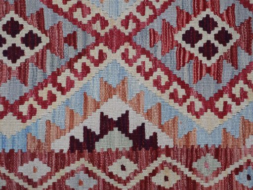 Backside of handmade New Modern Design rug showing knot structure and weave density