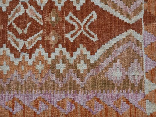 Backside of handmade New Modern Design rug showing knot structure and weave density