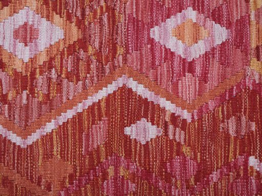 Backside of handmade New Modern Design rug showing knot structure and weave density