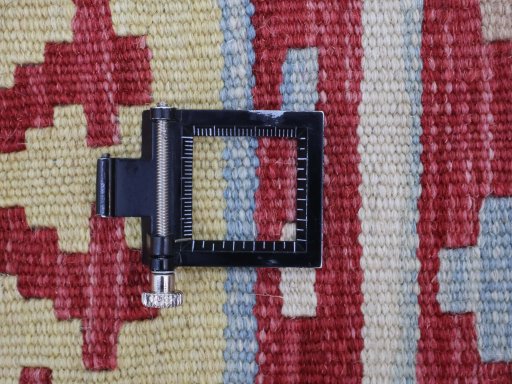 Corner detail of New Modern Design rug showing border pattern and Wool pile