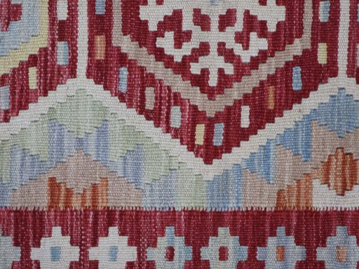 Backside of handmade New Modern Design rug showing knot structure and weave density