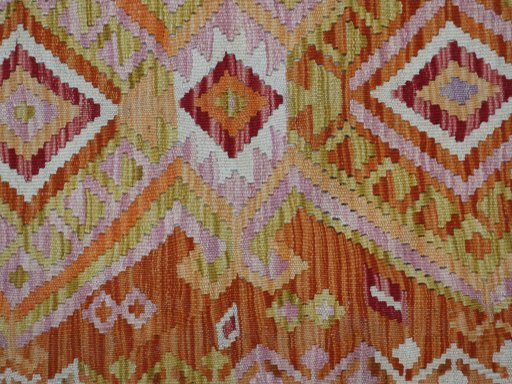 Backside of handmade New Modern Design rug showing knot structure and weave density