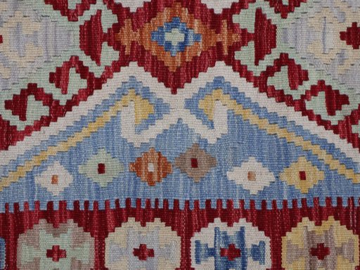 Backside of handmade New Modern Design rug showing knot structure and weave density
