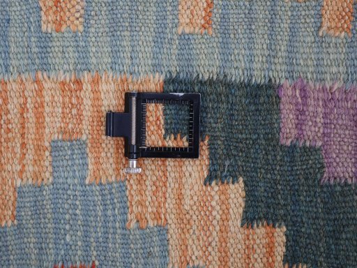 Corner detail of New Modern Design rug showing border pattern and Wool pile