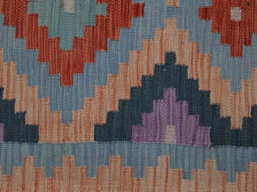 Backside of handmade New Modern Design rug showing knot structure and weave density
