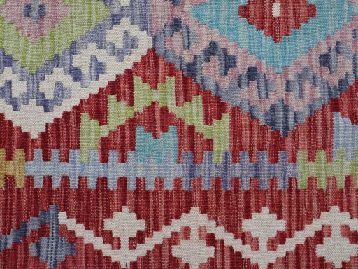Backside of handmade New Modern Design rug showing knot structure and weave density