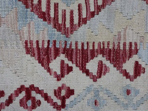 Backside of handmade New Modern Design rug showing knot structure and weave density