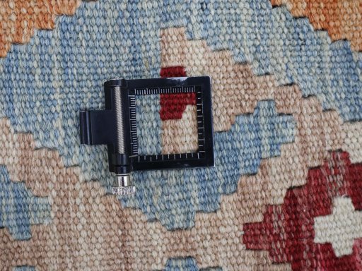 Corner detail of New Modern Design rug showing border pattern and Wool pile