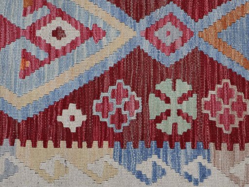 Backside of handmade New Modern Design rug showing knot structure and weave density