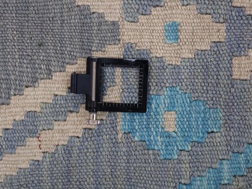 Corner detail of New Modern Design rug showing border pattern and Wool pile