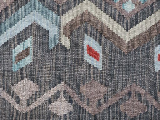 Backside of handmade New Modern Design rug showing knot structure and weave density