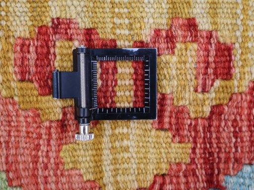 Corner detail of New Modern Design rug showing border pattern and Wool pile