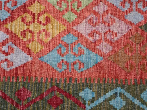 Backside of handmade New Modern Design rug showing knot structure and weave density