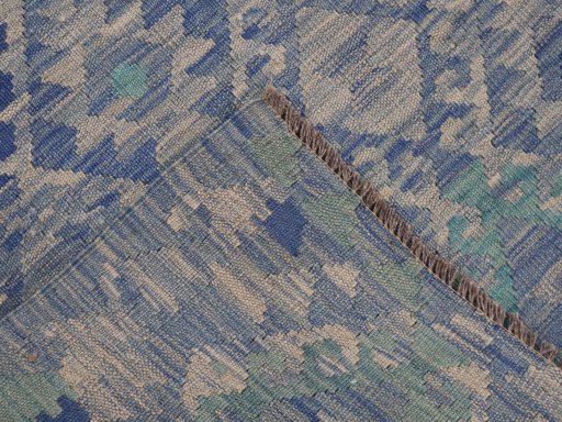 Surface texture of New Modern Design rug with natural Wool and intricate pattern