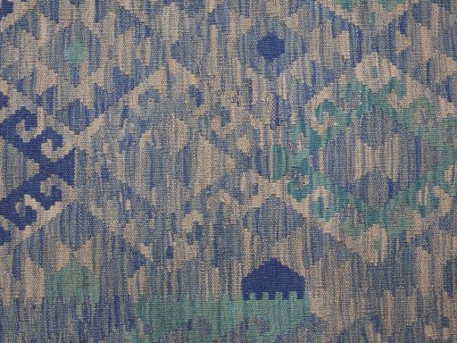 Backside of handmade New Modern Design rug showing knot structure and weave density