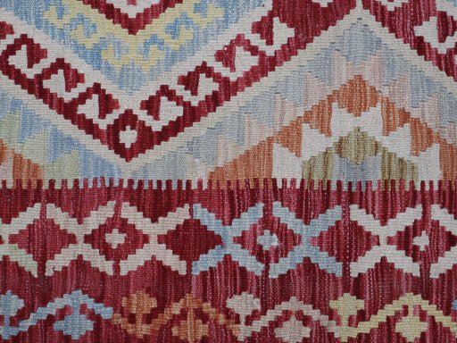 Backside of handmade New Modern Design rug showing knot structure and weave density