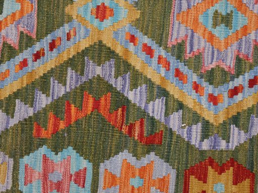 Backside of handmade New Modern Design rug showing knot structure and weave density