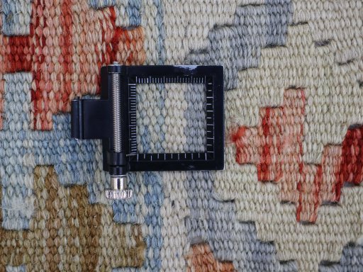 Corner detail of New Modern Design rug showing border pattern and Wool pile