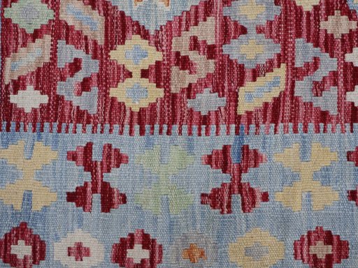 Backside of handmade New Modern Design rug showing knot structure and weave density