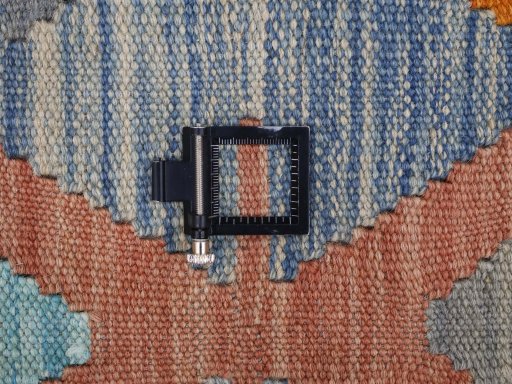 Corner detail of New Modern Design rug showing border pattern and Wool pile