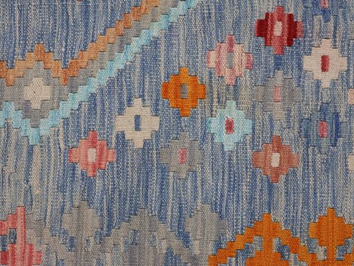 Backside of handmade New Modern Design rug showing knot structure and weave density