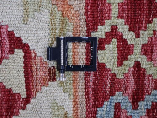 Corner detail of New Modern Design rug showing border pattern and Wool pile