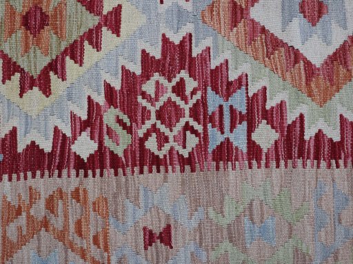 Backside of handmade New Modern Design rug showing knot structure and weave density