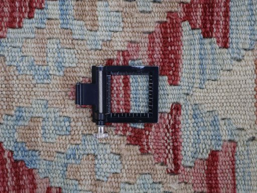 Corner detail of New Modern Design rug showing border pattern and Wool pile
