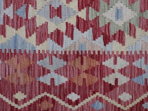 Backside of handmade New Modern Design rug showing knot structure and weave density