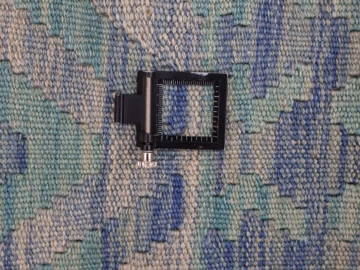 Corner detail of New Modern Design rug showing border pattern and Wool pile