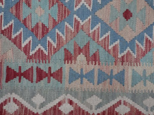 Backside of handmade New Modern Design rug showing knot structure and weave density