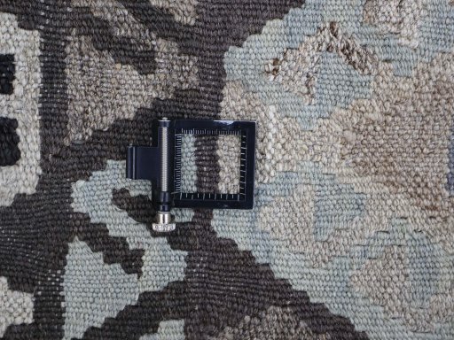 Corner detail of New Modern Design rug showing border pattern and Wool pile