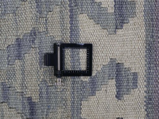 Corner detail of New Modern Design rug showing border pattern and Wool pile