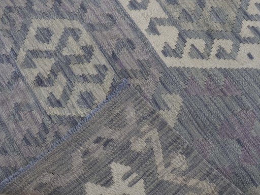 Surface texture of New Modern Design rug with natural Wool and intricate pattern