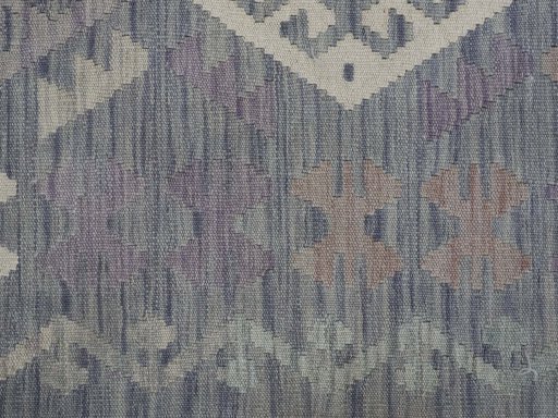 Backside of handmade New Modern Design rug showing knot structure and weave density