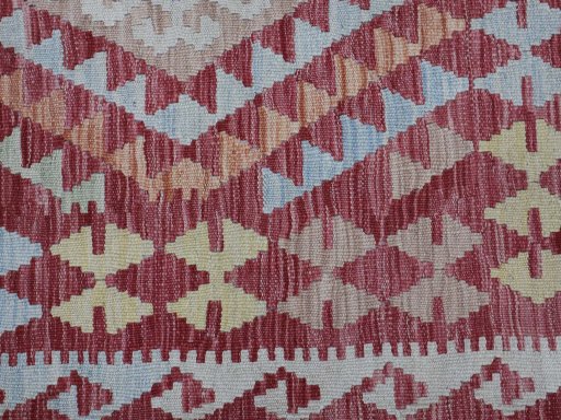 Backside of handmade New Modern Design rug showing knot structure and weave density