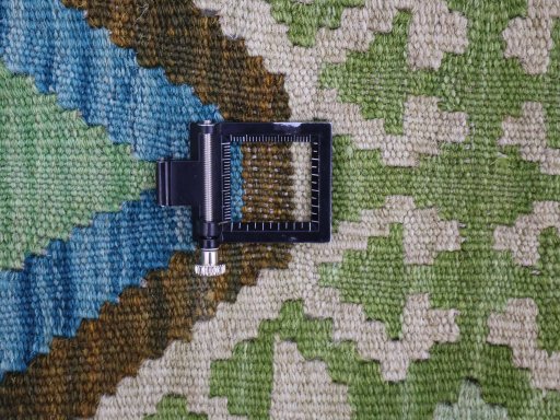 Corner detail of New Modern Design rug showing border pattern and Wool pile